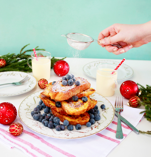 Enjoy a festive breakfast the RIGHT way, with a big helping of  Eggnog French Toast! (Click through for the full recipe)