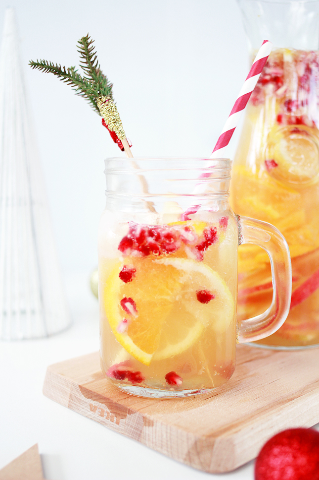 Get boozy on Christmas Day with some  Apple Cider White Sangria - it's just fancy punch!