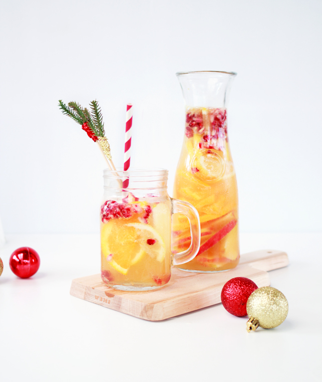 Get boozy on Christmas Day with some  Apple Cider White Sangria - it's just fancy punch!