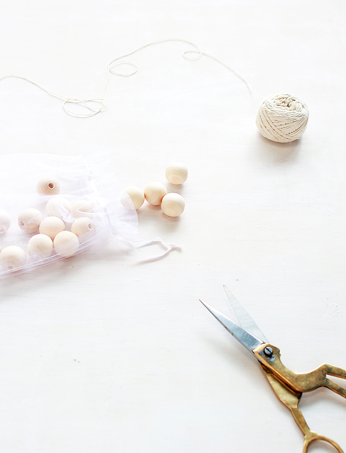 It only takes 5 minutes to make these simple wooden bead garlands! 