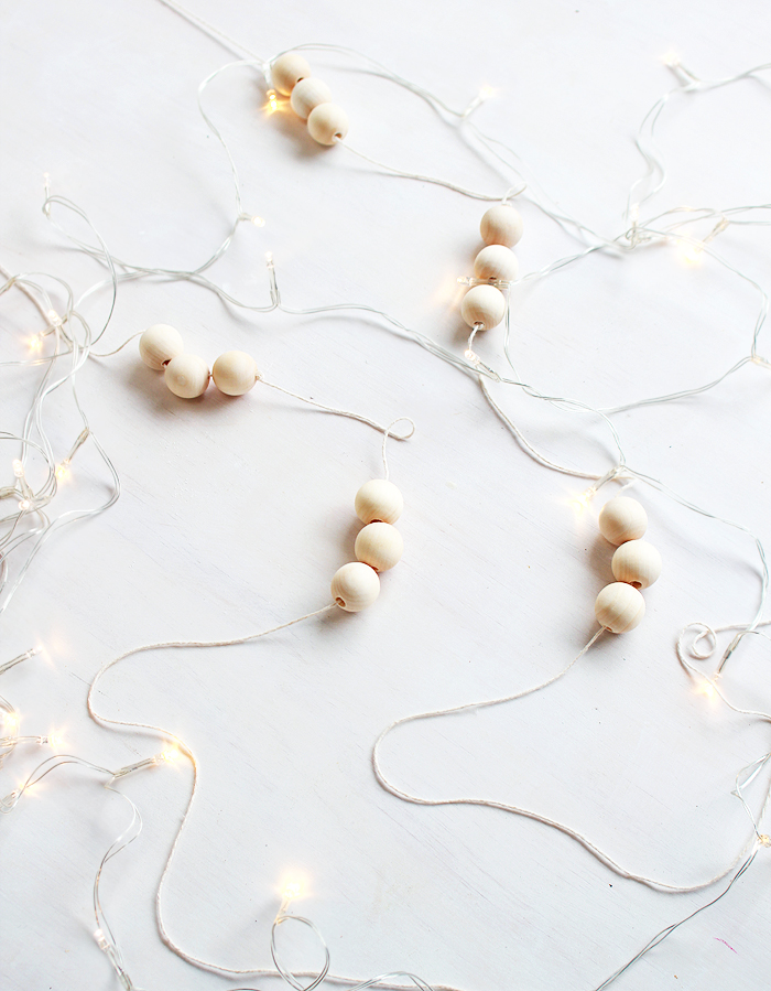 It only takes 5 minutes to make these simple wooden bead garlands! 